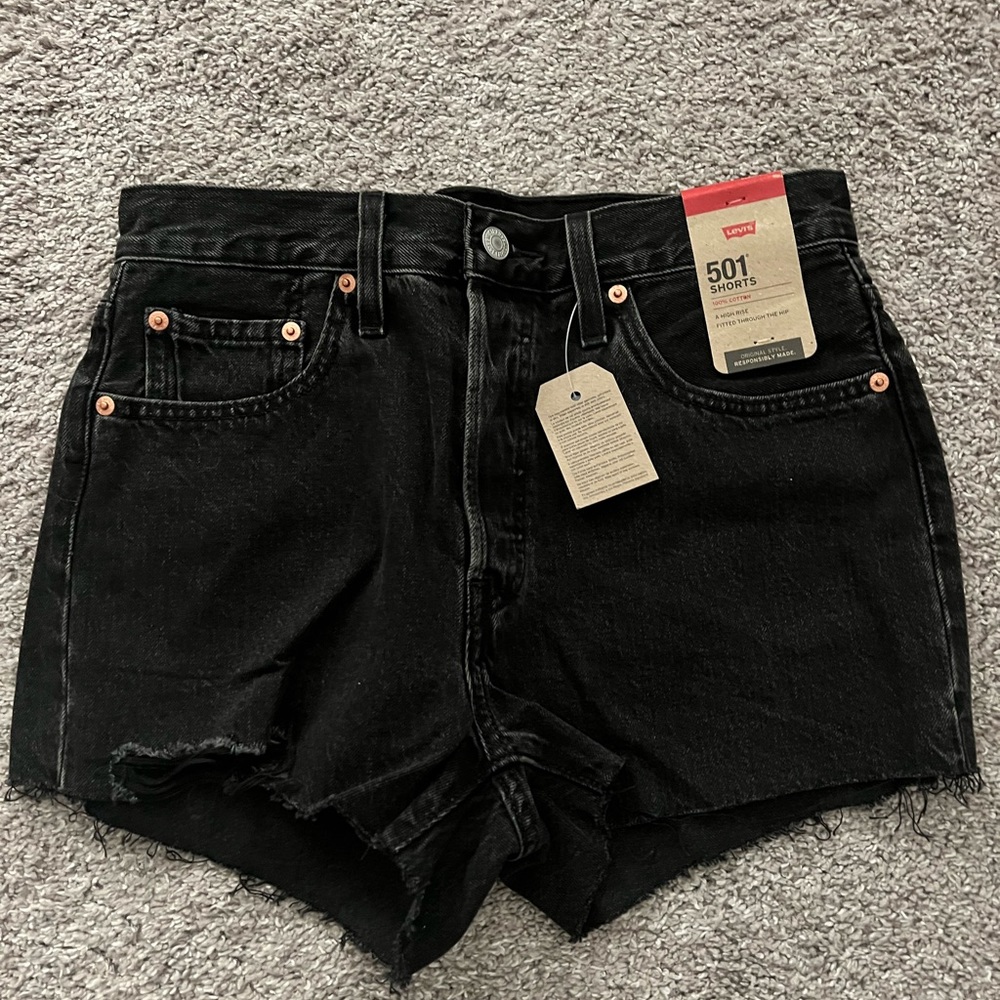 Levis 501 shorts. Women’s size 28. Black. Distressed.